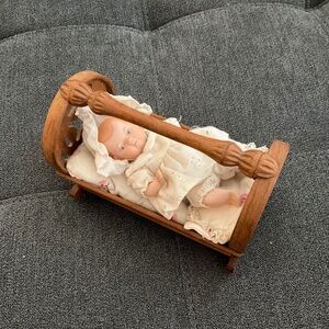 EUC Vintage Porcelain Baby Doll in Carved Wooden Cradle